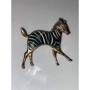 Vintage goldtone metal zebra brooch green black lacquer